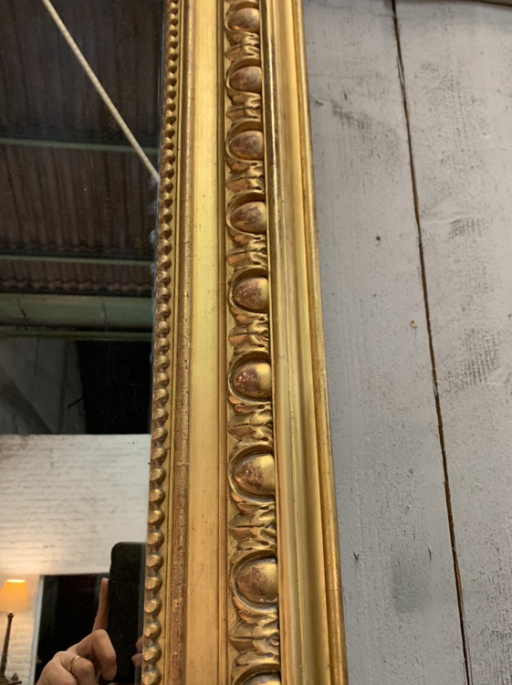 Gilt Louis Philippe mirror with gadroon decor,  mid XIXth